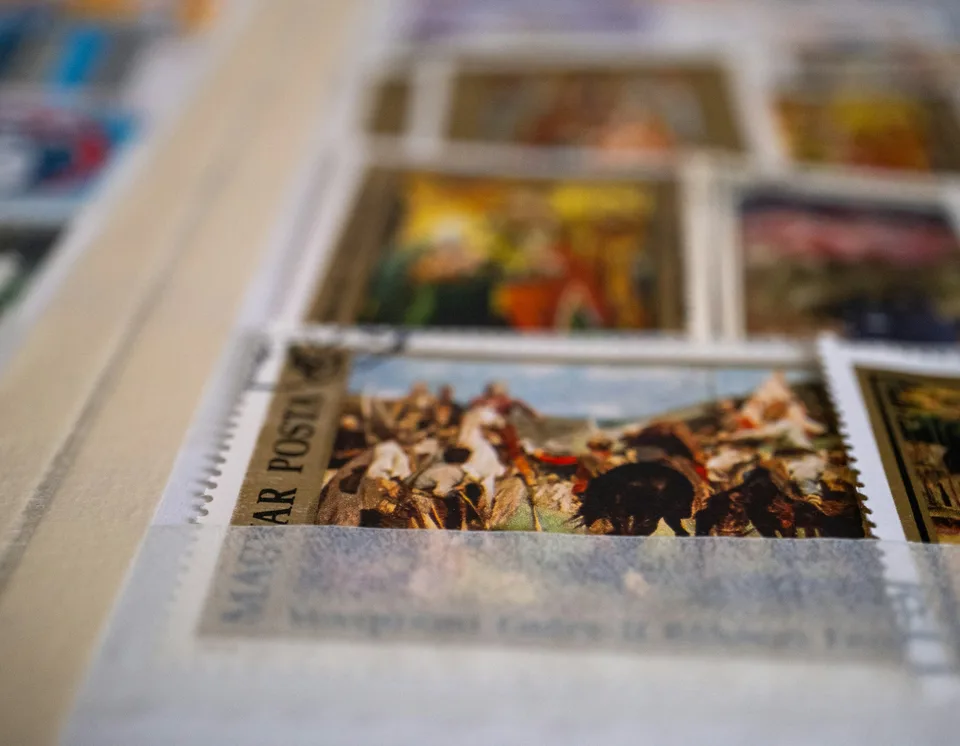 a bunch of stamps that are on a table